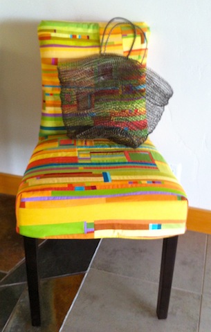 Chair upholstered with Jean Wells' quilt art